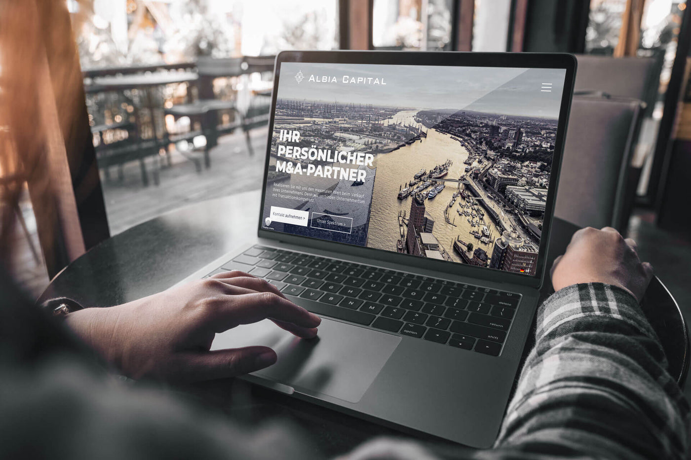 After — a defined hierarchy, mobile-first layout, and messaging that leads with cross-border M&A expertise.