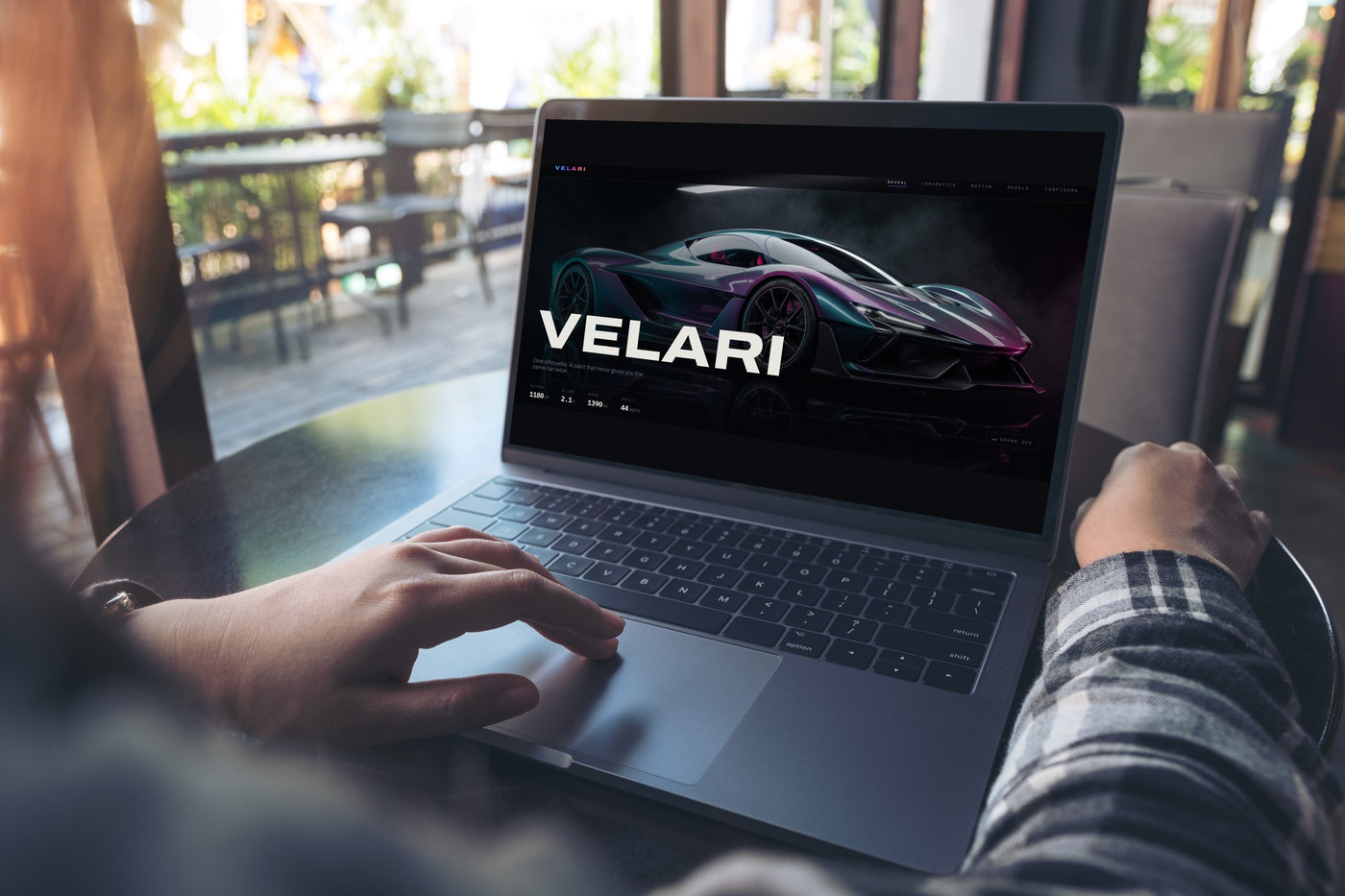 The reveal — VELARI's opening experience on desktop, where the product dominates before any technical detail.